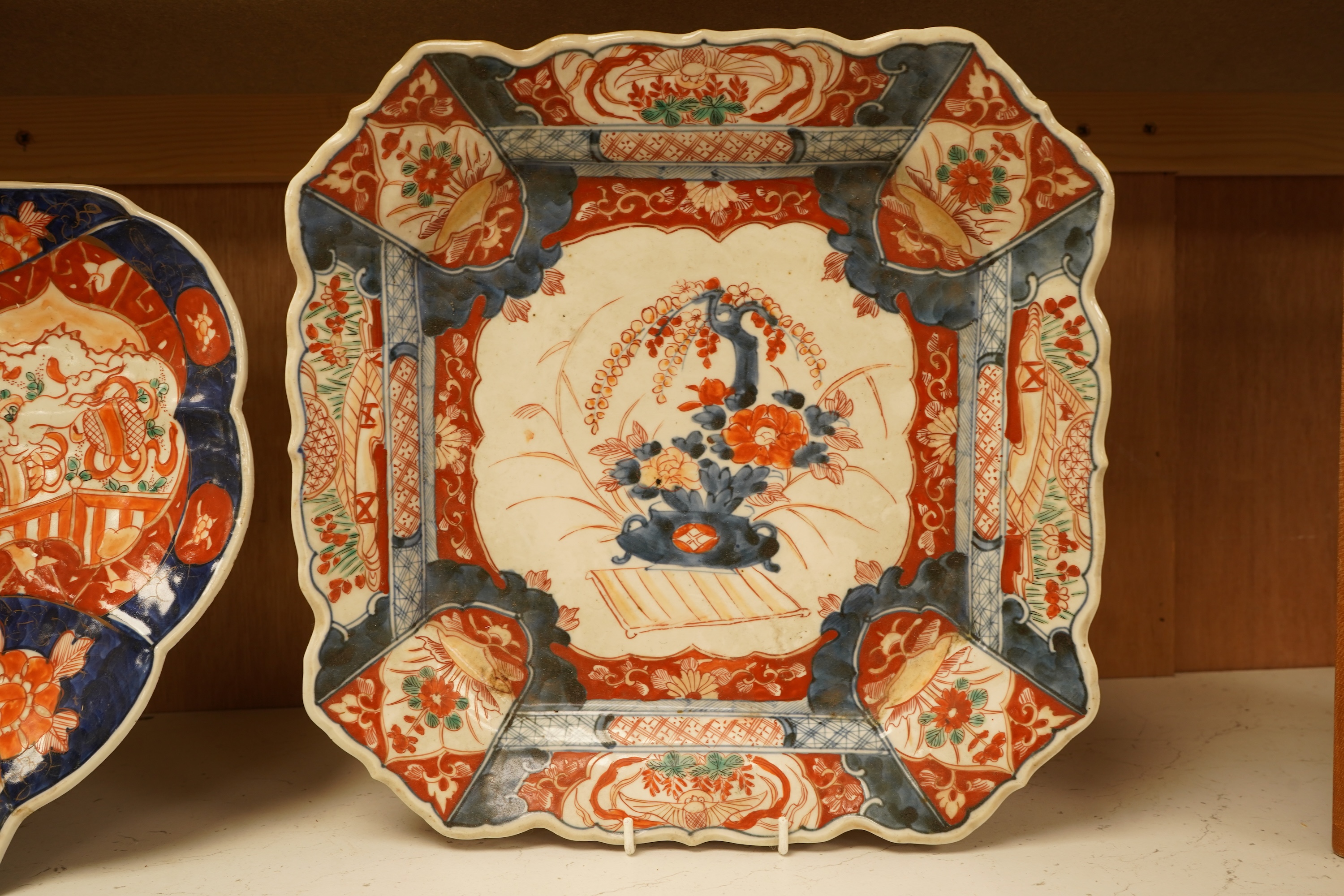 Two large Japanese Imari dishes, 19th century, to include one designed as an insect, largest 32cm wide
